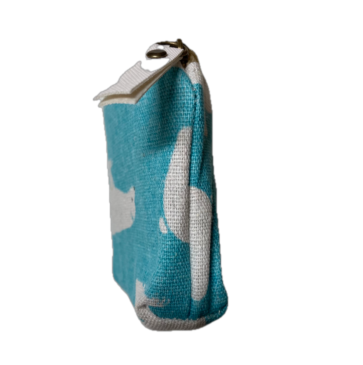 End view of Blue and white patterned zipper pouch on table