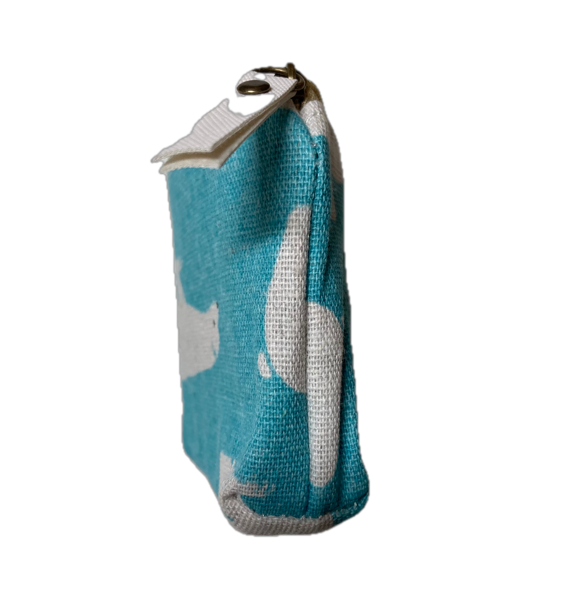 End view of Blue and white patterned zipper pouch on table